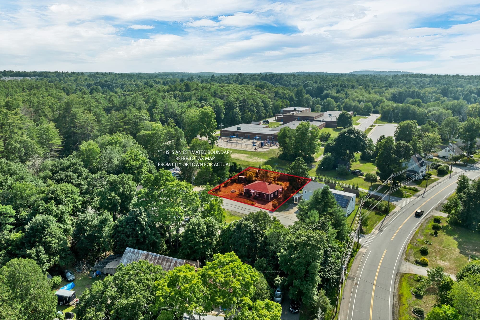 Aerial view with the property boundary outlined, a short distance from downtown Newmarket