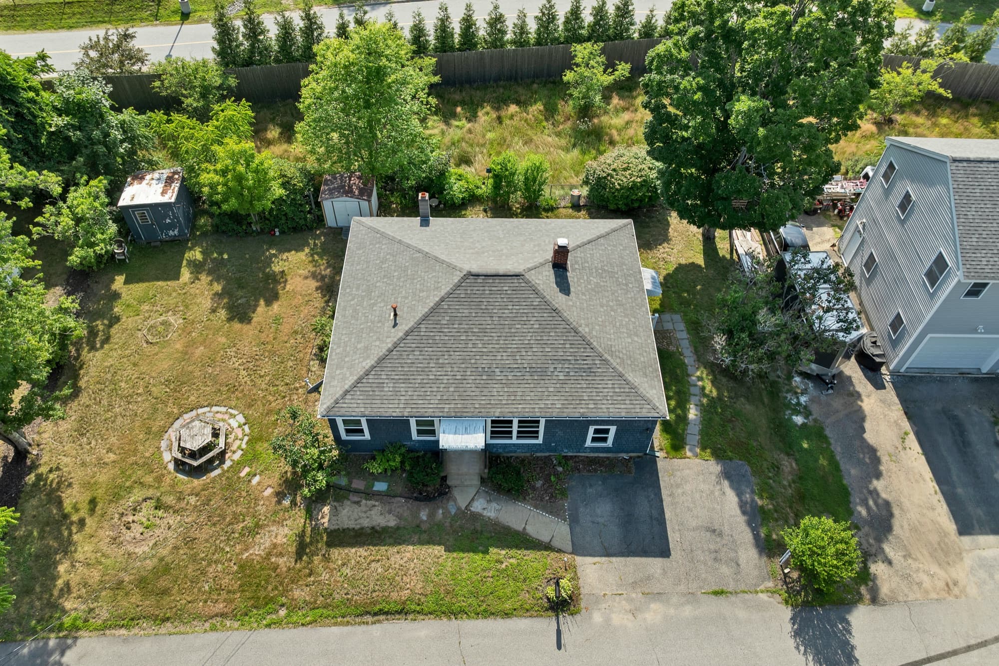 Aerial view of the home and its 0.16 acre lot
